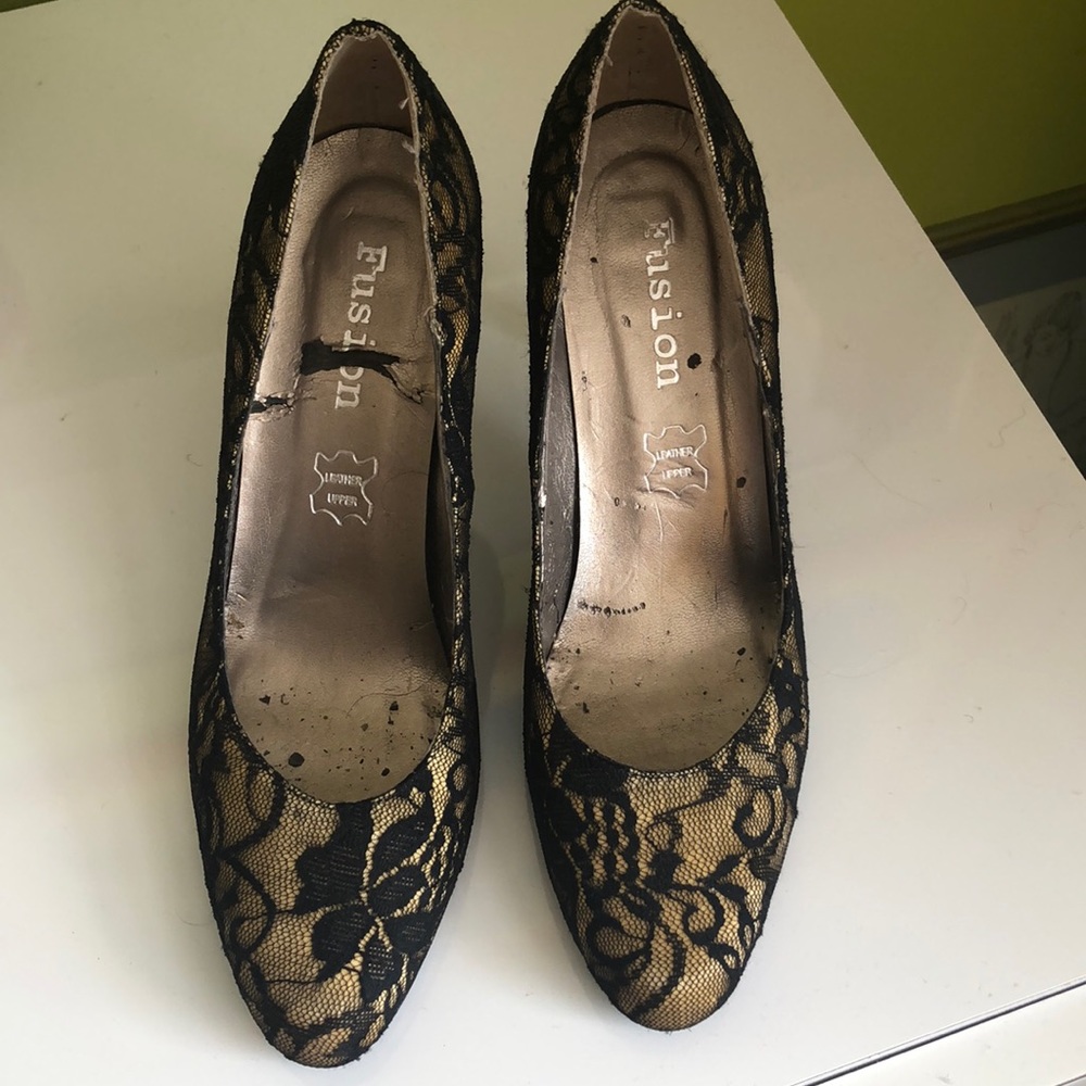 Black lace covered pumps